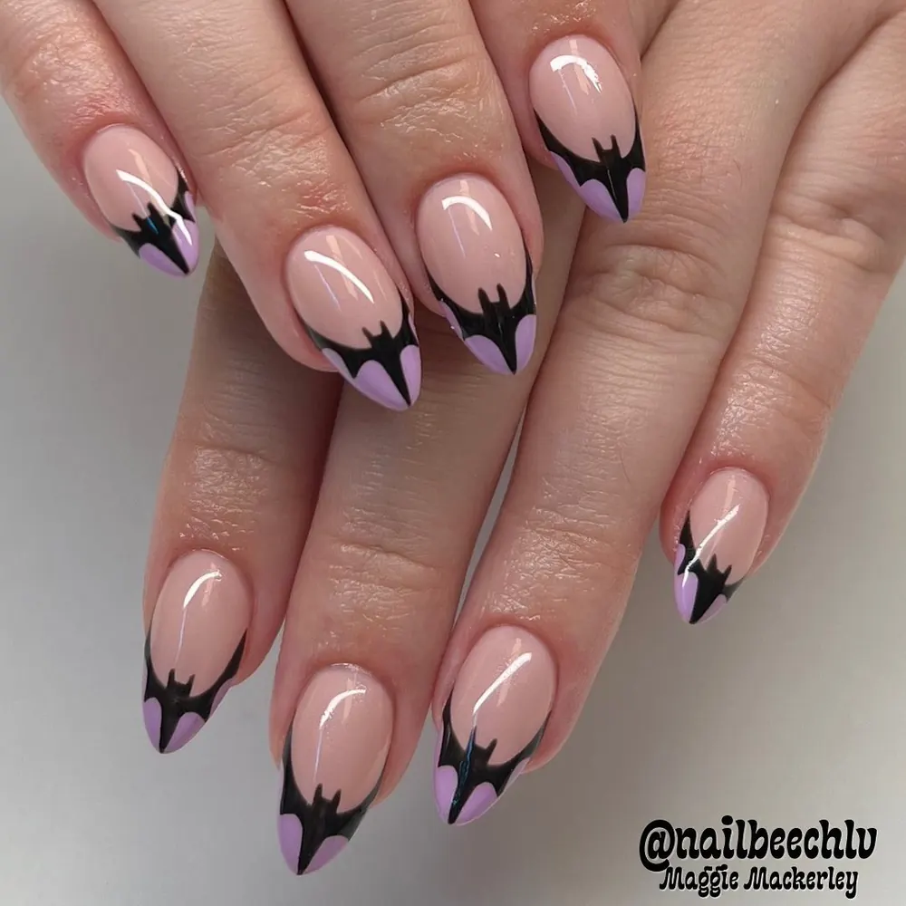 Nude Almond Nails with Lilac and Black Bat Tips
