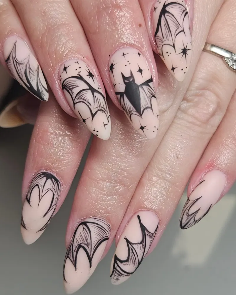 Long Nude Nails with Black Bat and Web Linework