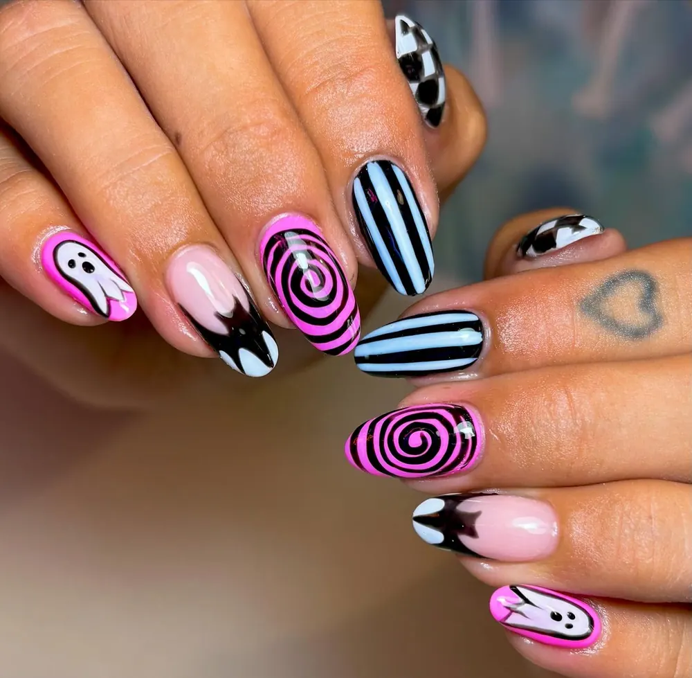 Pink, Black, and White Nails with Bats and Swirls