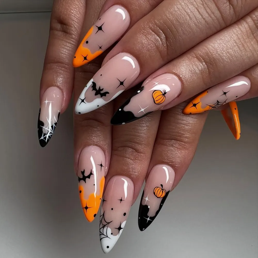 Orange and Nude Halloween Nails with Bats and Pumpkins