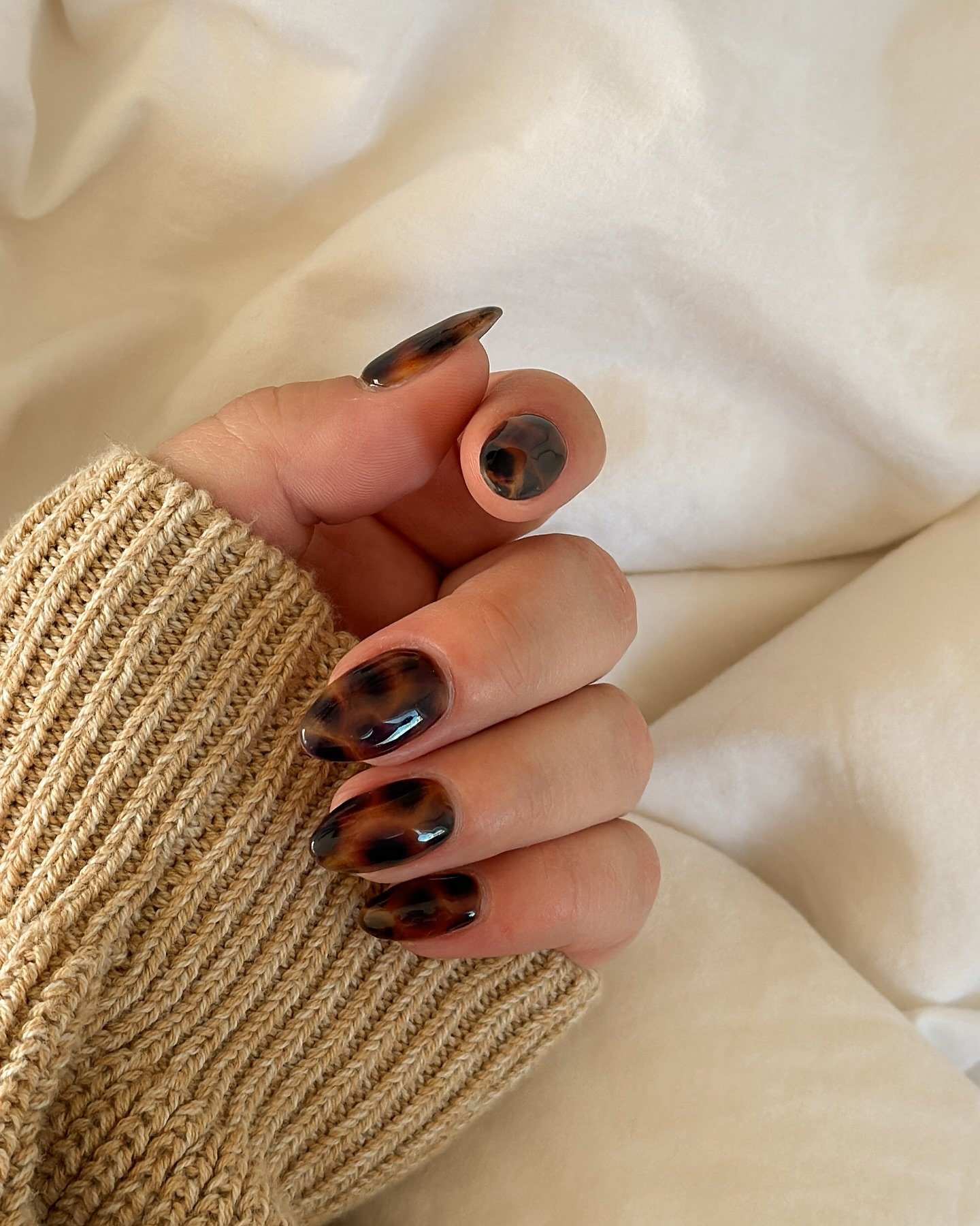 Warm Nude Nails with Brown Swirls