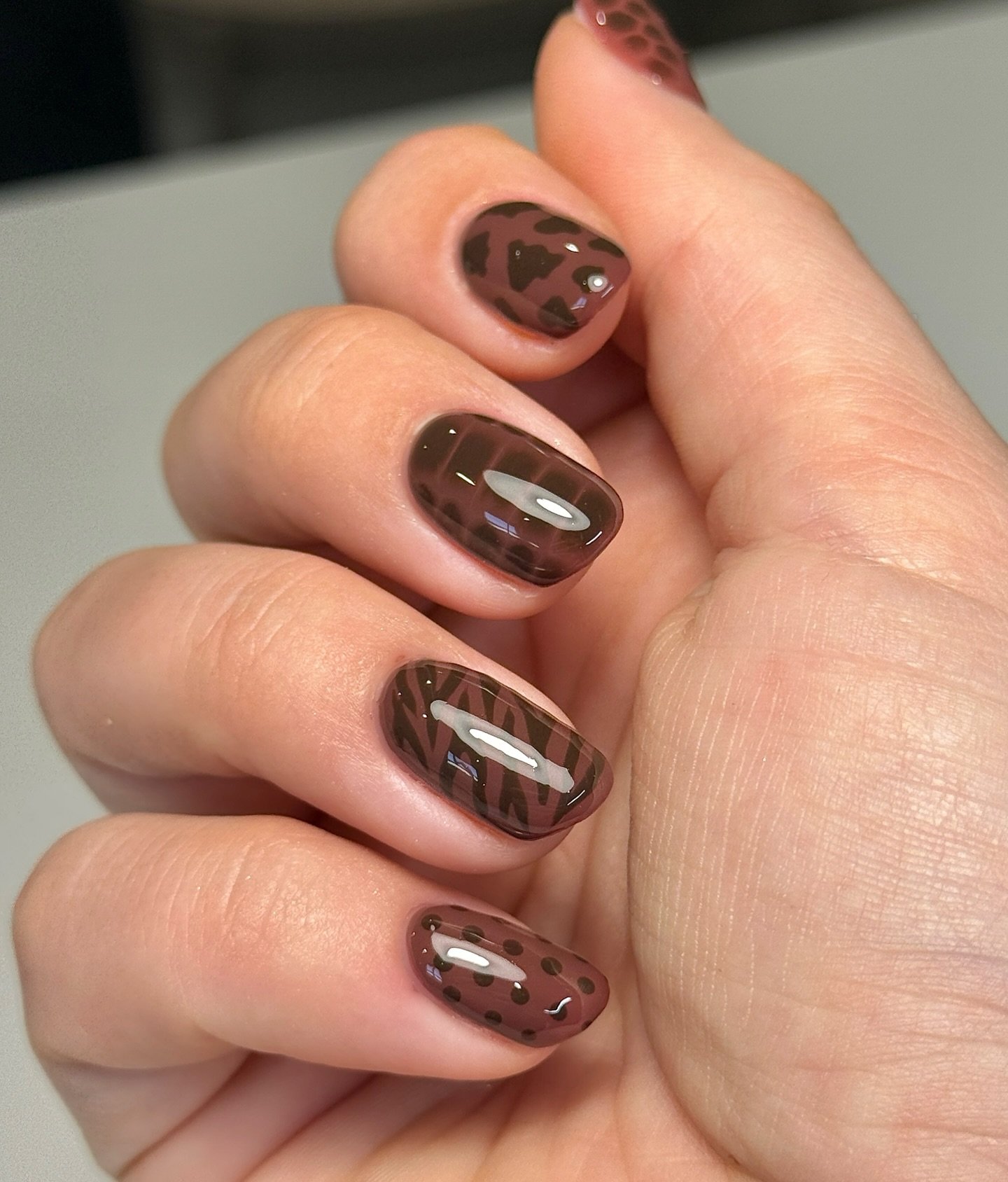 Brown Nails with Dark Patterned Accents