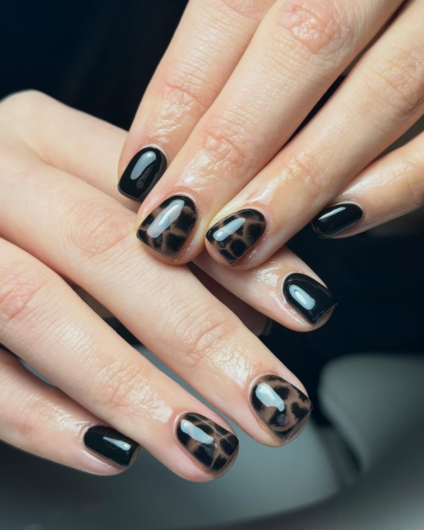 Glossy Black Nails with Brown Accents