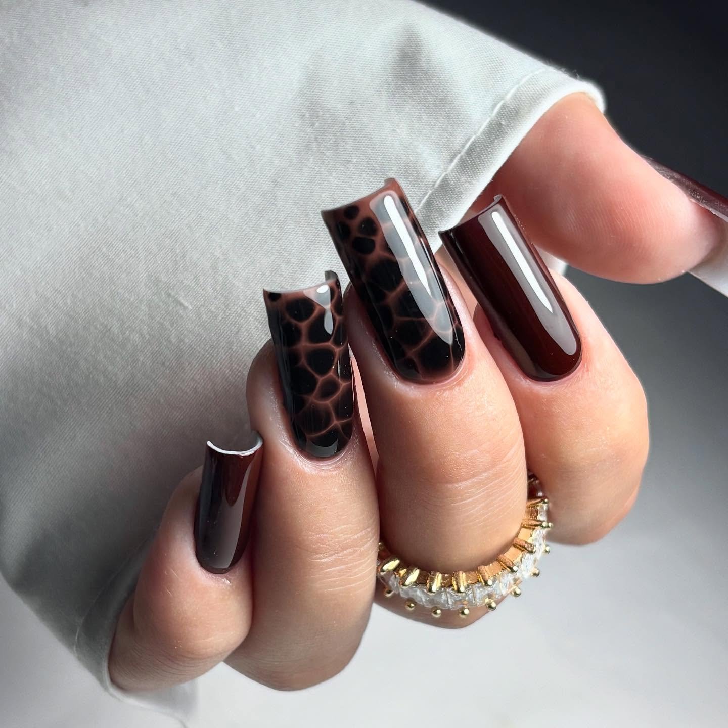 Dark Brown Nails with Animal-Print Accents
