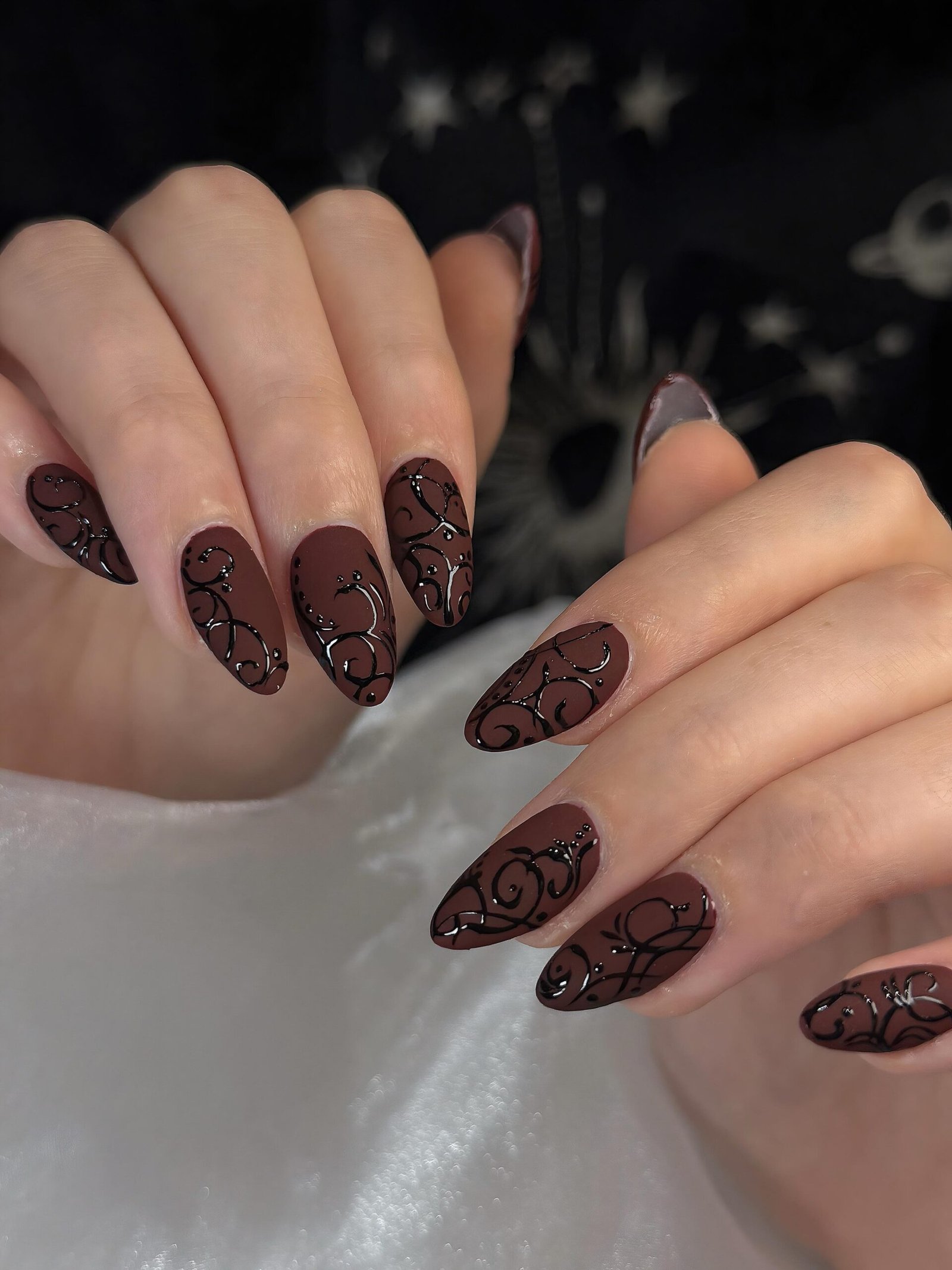 Dark Brown Nails with Ornate Patterned Details