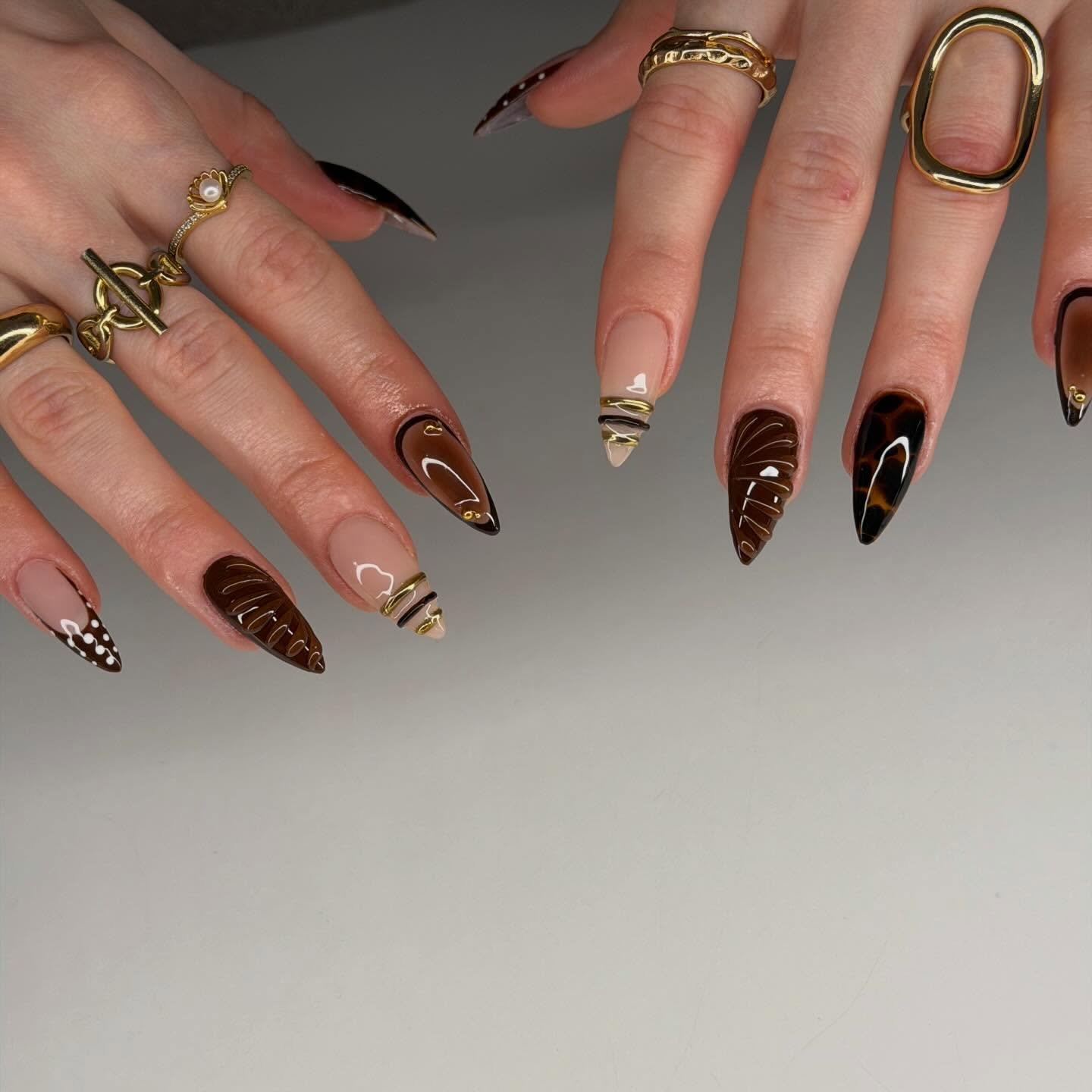 Brown and Patterned Pointed Nails