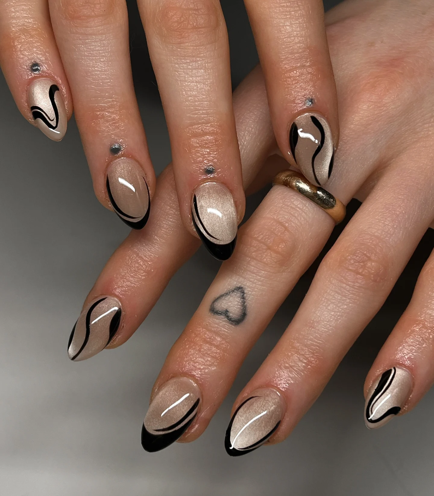 Nude Nails with Black-and-Brown Curved Lines