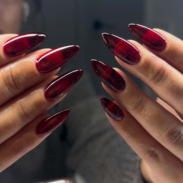 Glossy Black Cherry Stiletto Nails