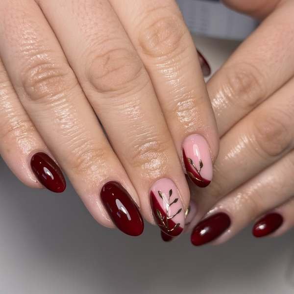Black Cherry Nails with a Pink Floral Accent