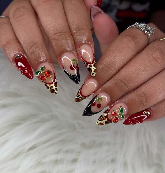Festive Black Cherry Nails with Nude and Leopard Accents
