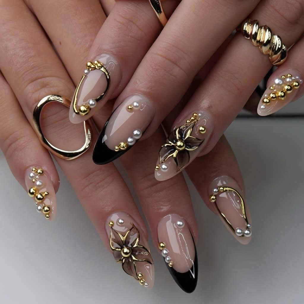 Sheer Nude Almond Nails with Gold Embellishments
