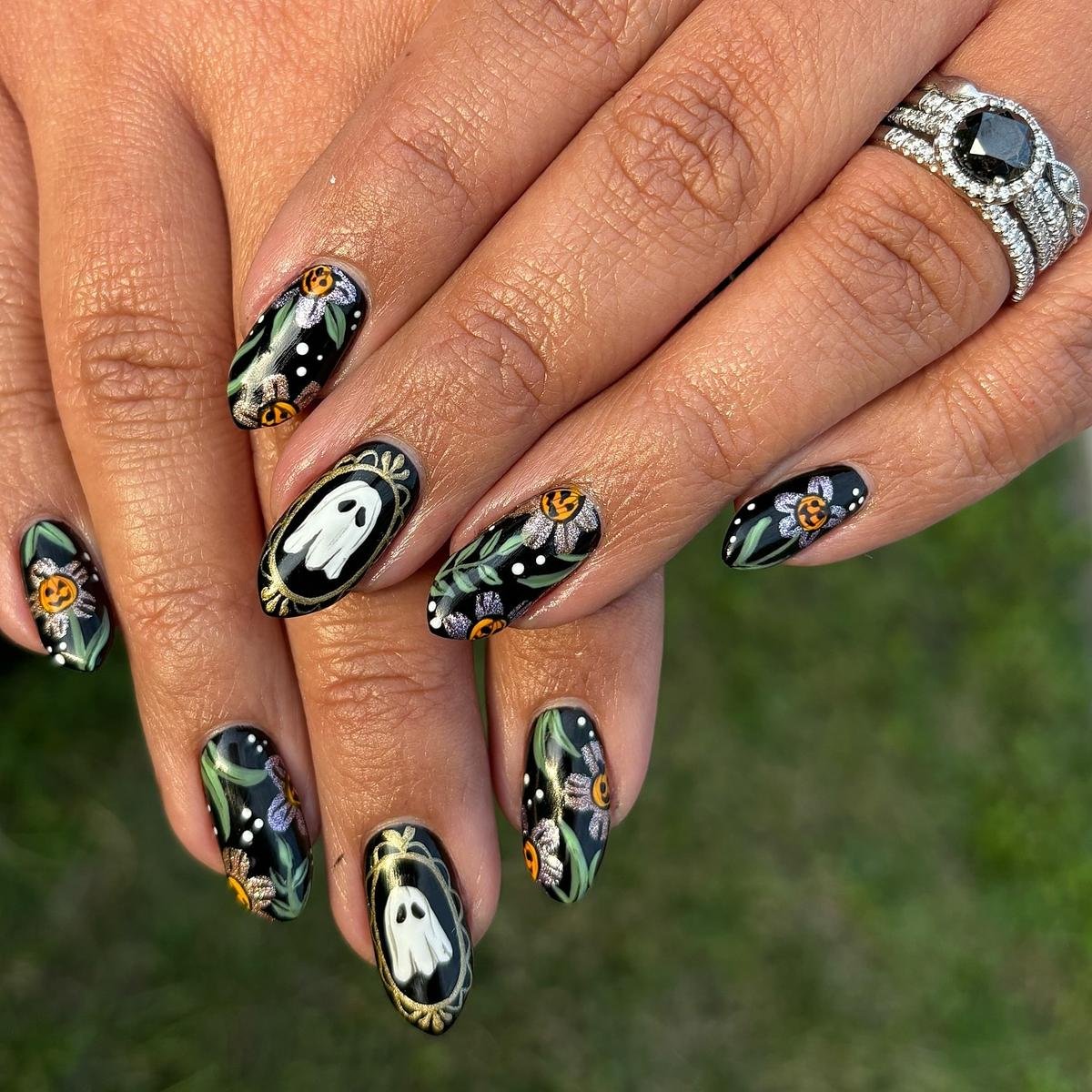 Black Nails with Colorful Botanical Artwork