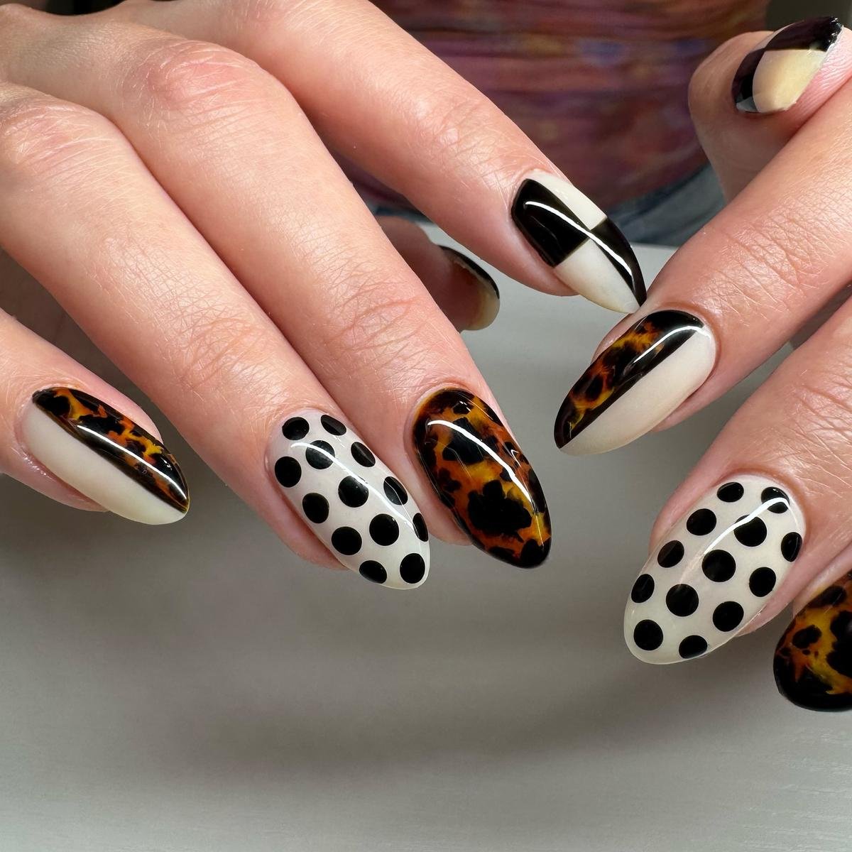 Black, White, and Tortoiseshell Almond Nails