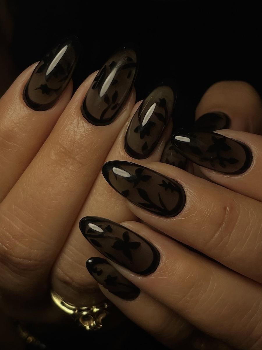 Black Almond Nails with Warm Abstract Accents