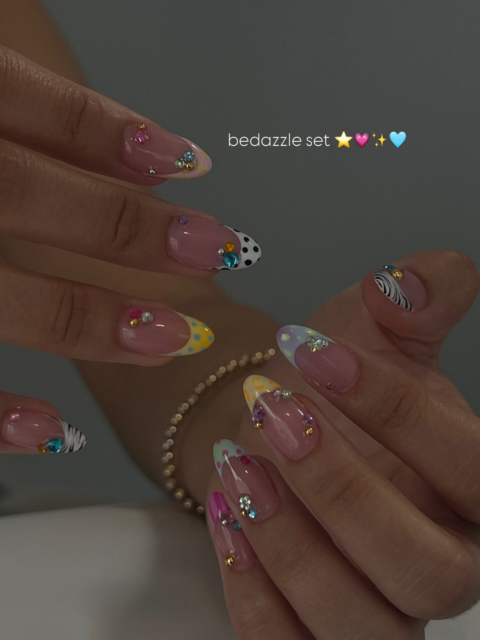 Long Pink Nails with Colorful Rhinestones and Sparkly Tips