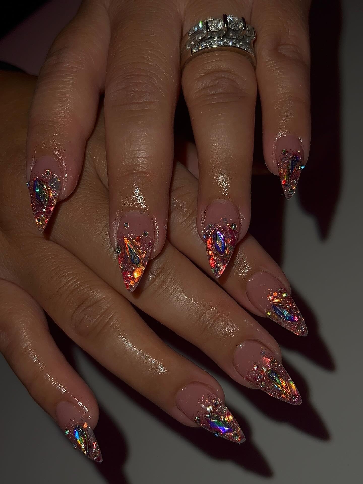 Dark Berry Stiletto Nails with Multicolor Glitter and Rhinestones