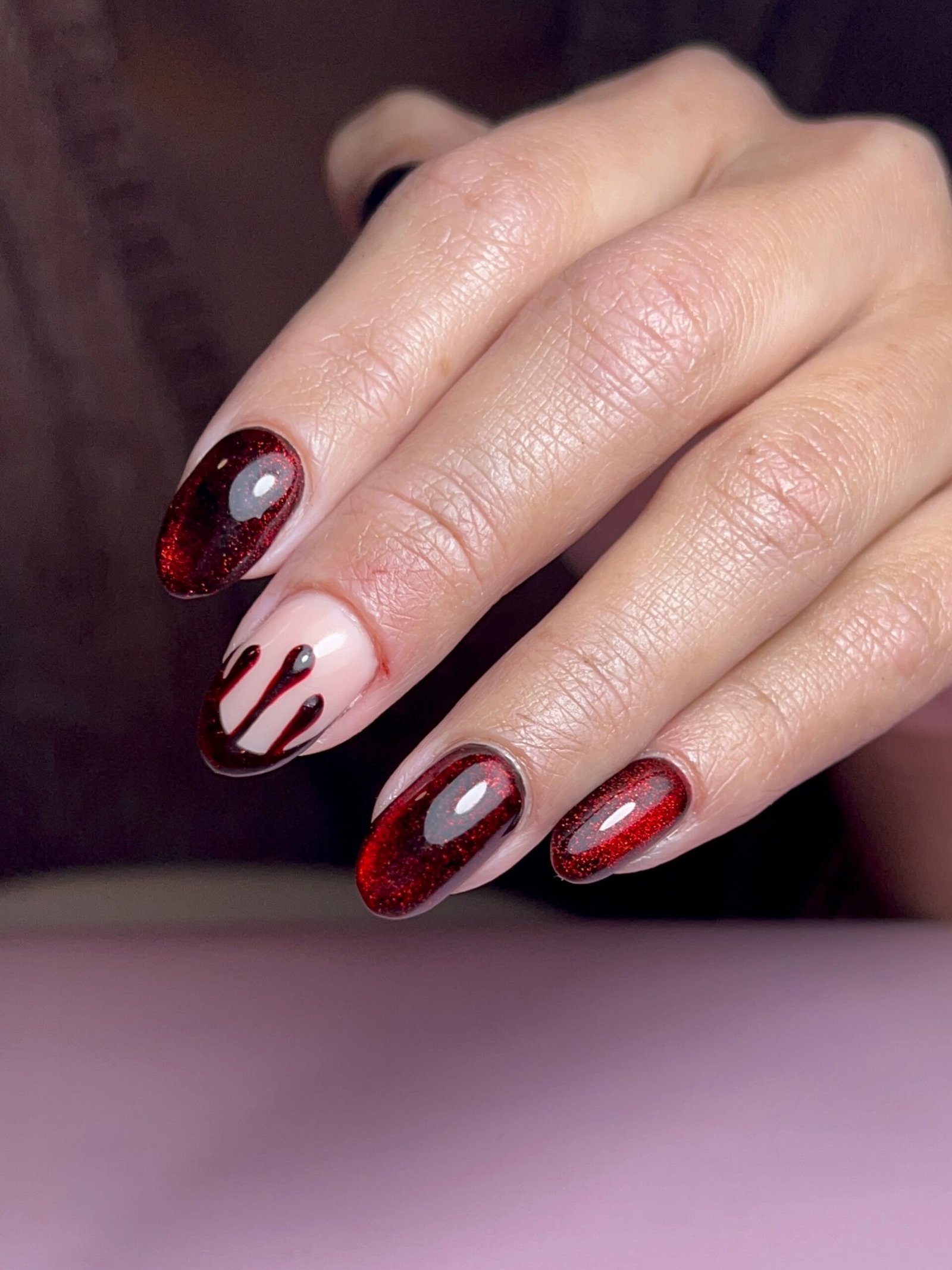 Burgundy and Nude Almond Nails with Red Accent Details