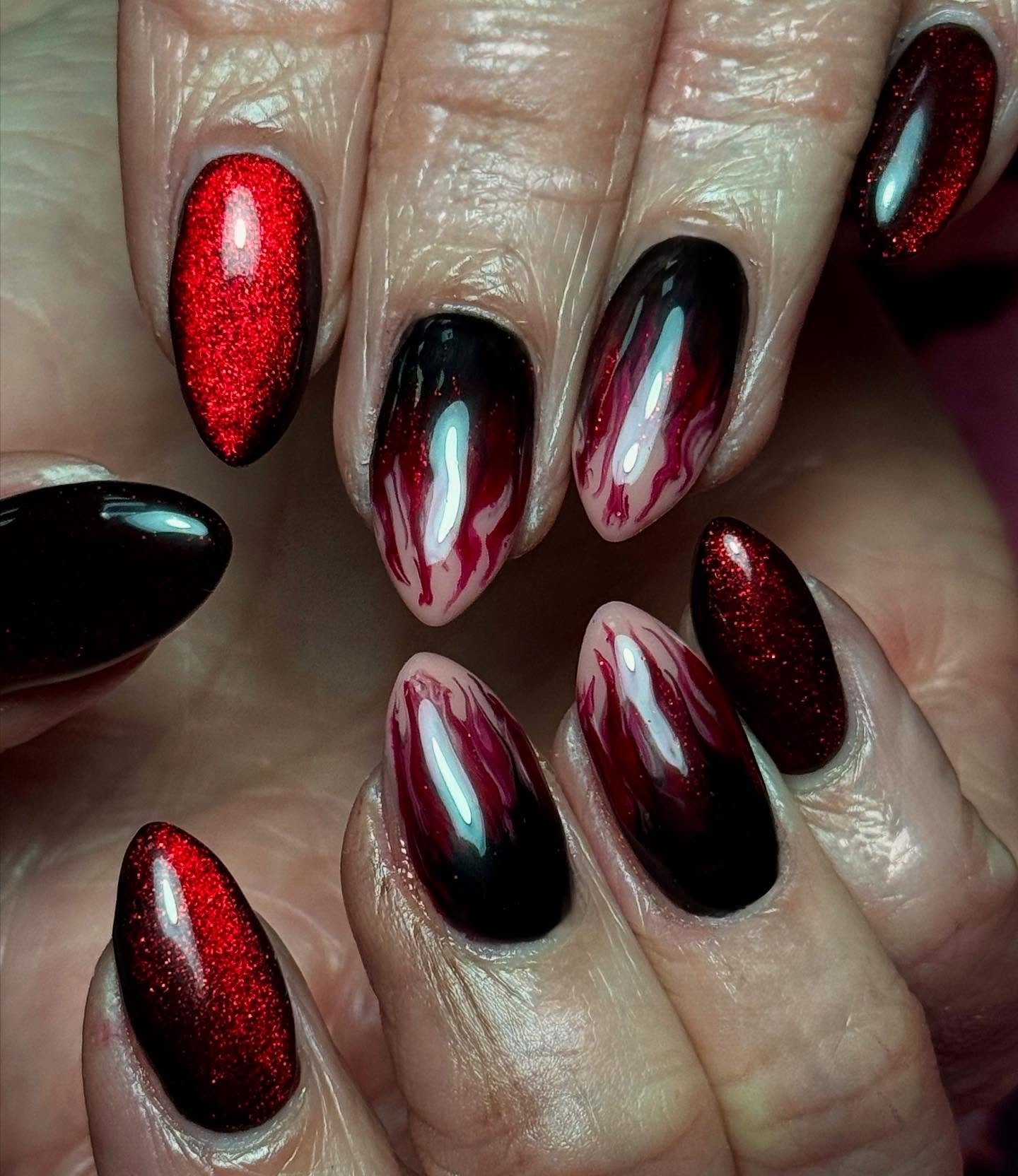 Black and Red Almond Nails with Reflective Metallic Details