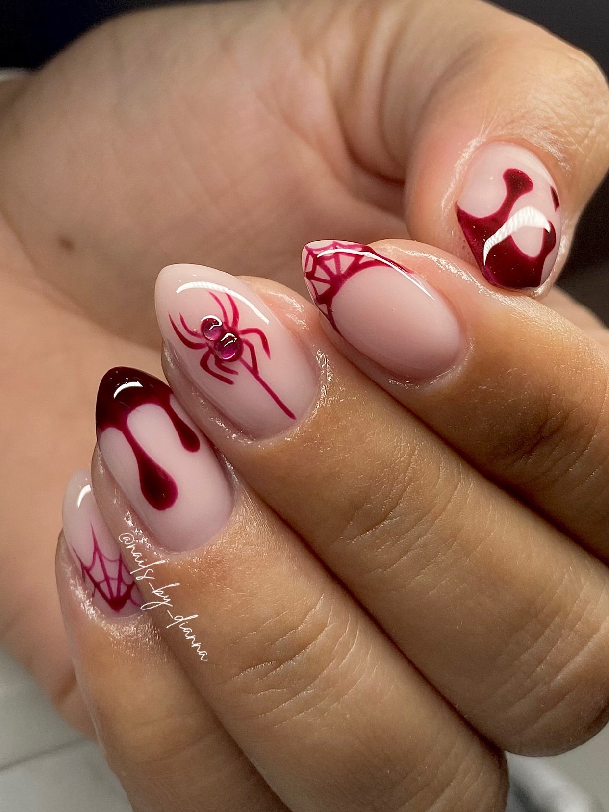 Soft Nude Almond Nails with Deep Red Hearts and Line Art