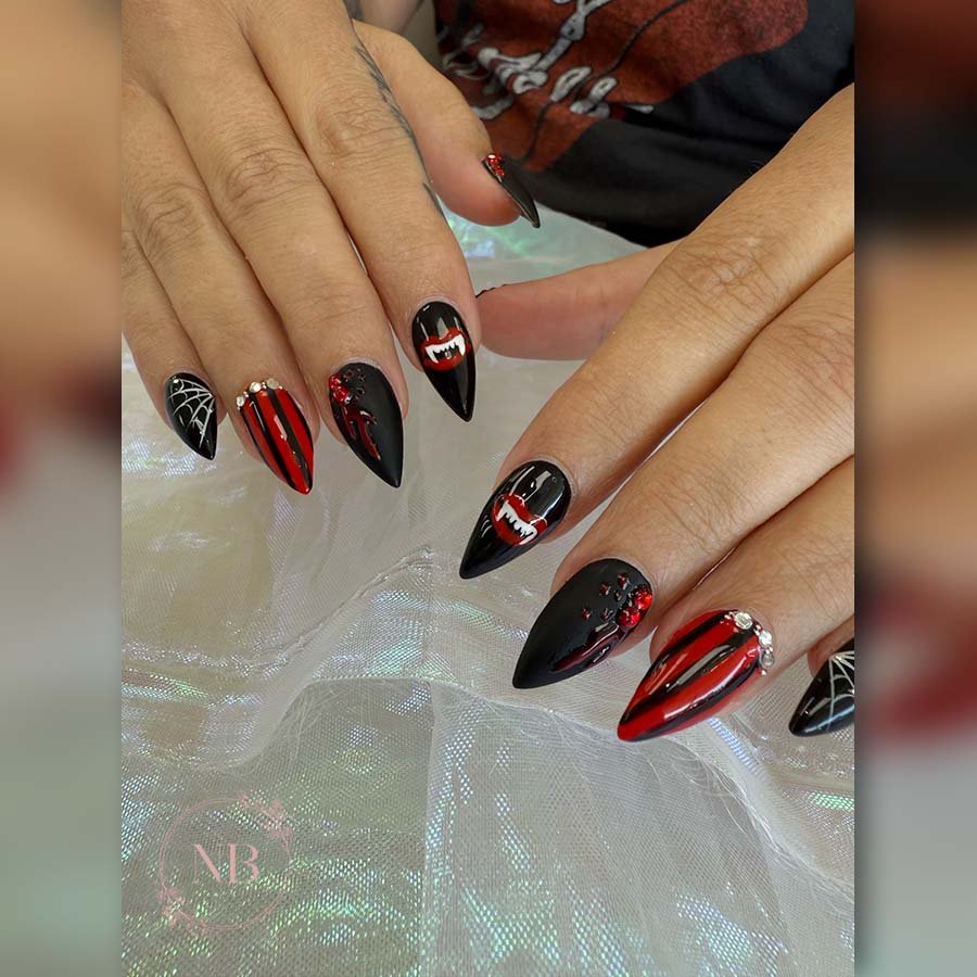 Black and Blood-Red Stiletto Nails with Graphic Patterns