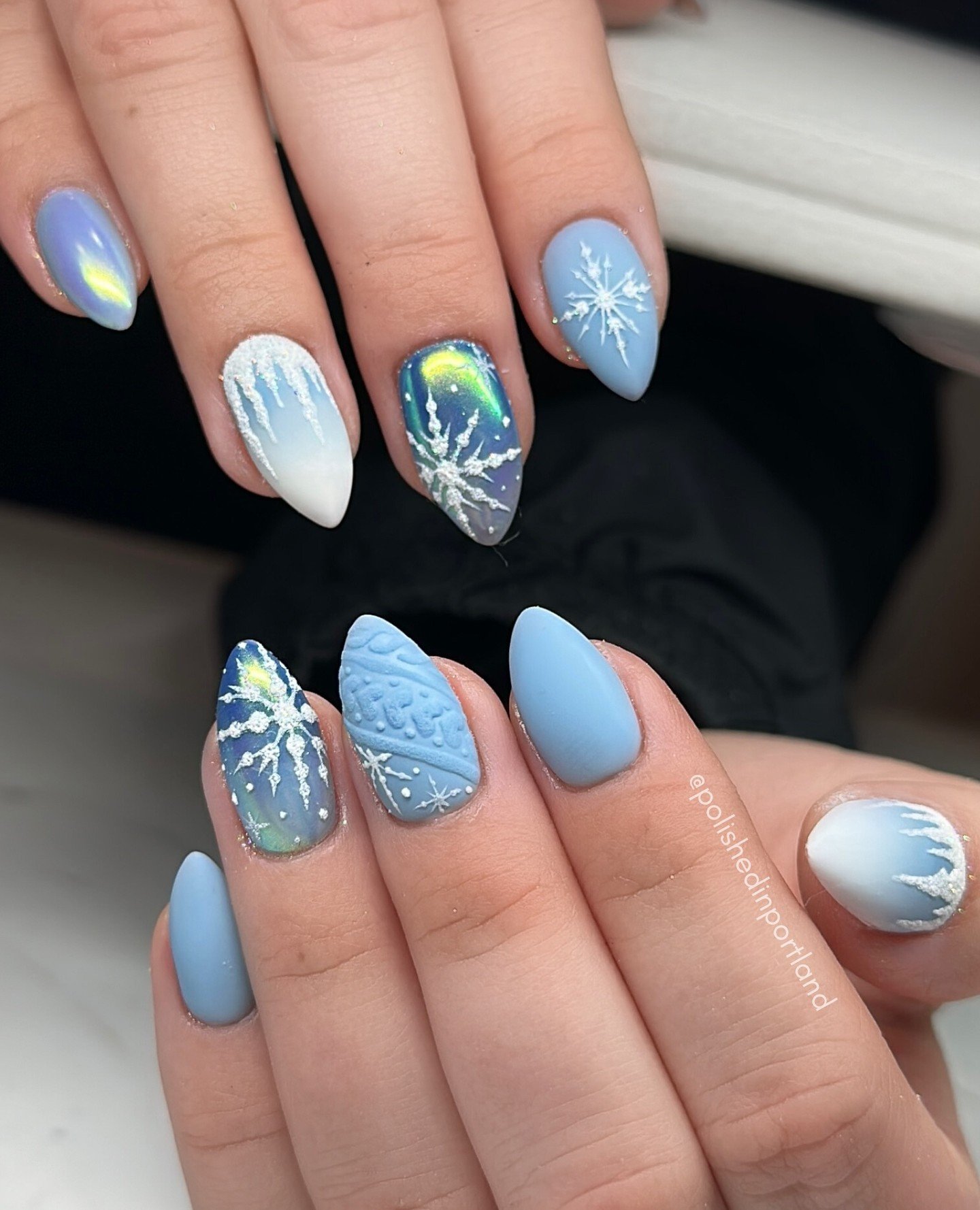 Blue Christmas nails idea 2: Blush Pink and Navy French Almond Nails with Fine Line Accents