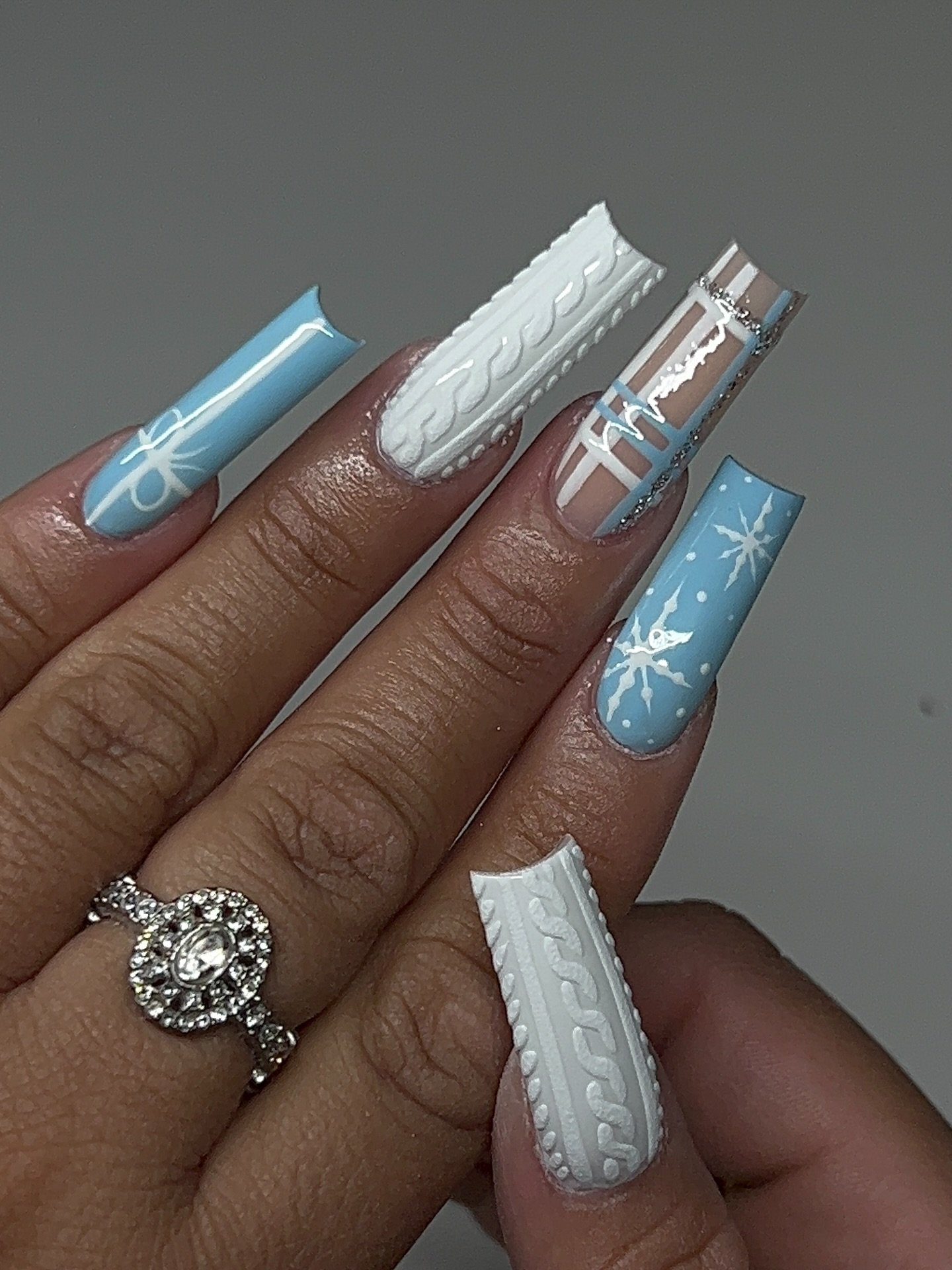 Blue Christmas nails idea 6: Blue, Silver, and White Textured Long Square Nails
