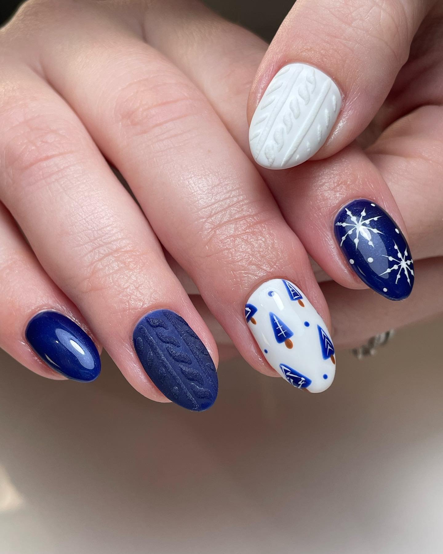 Blue Christmas nails idea 11: Blue and White Knit-Texture Christmas Nails