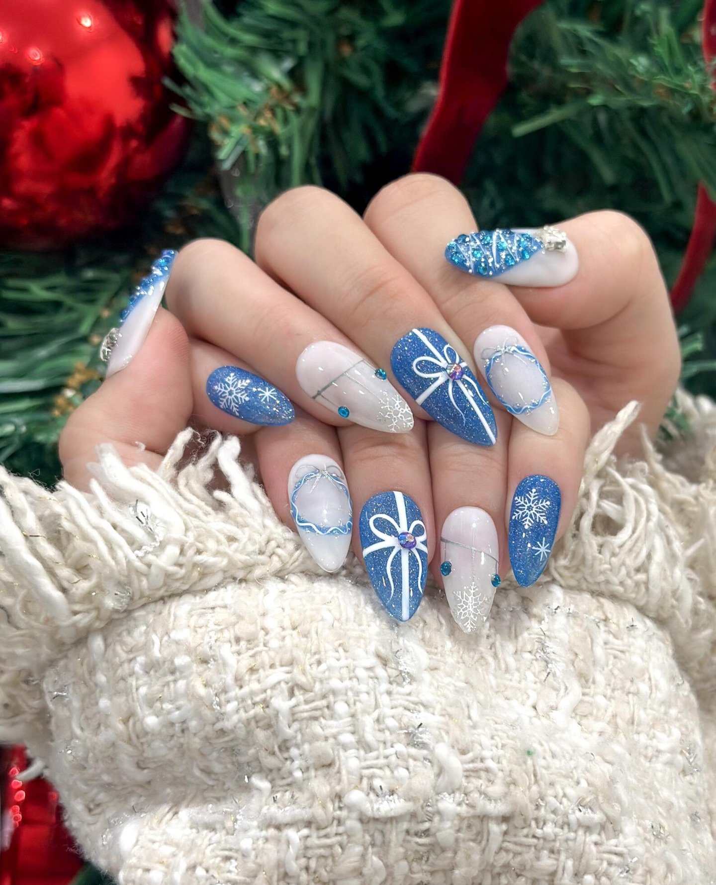 Blue Christmas nails idea 32: Blue Glitter, Nude, and Silver Christmas Nails