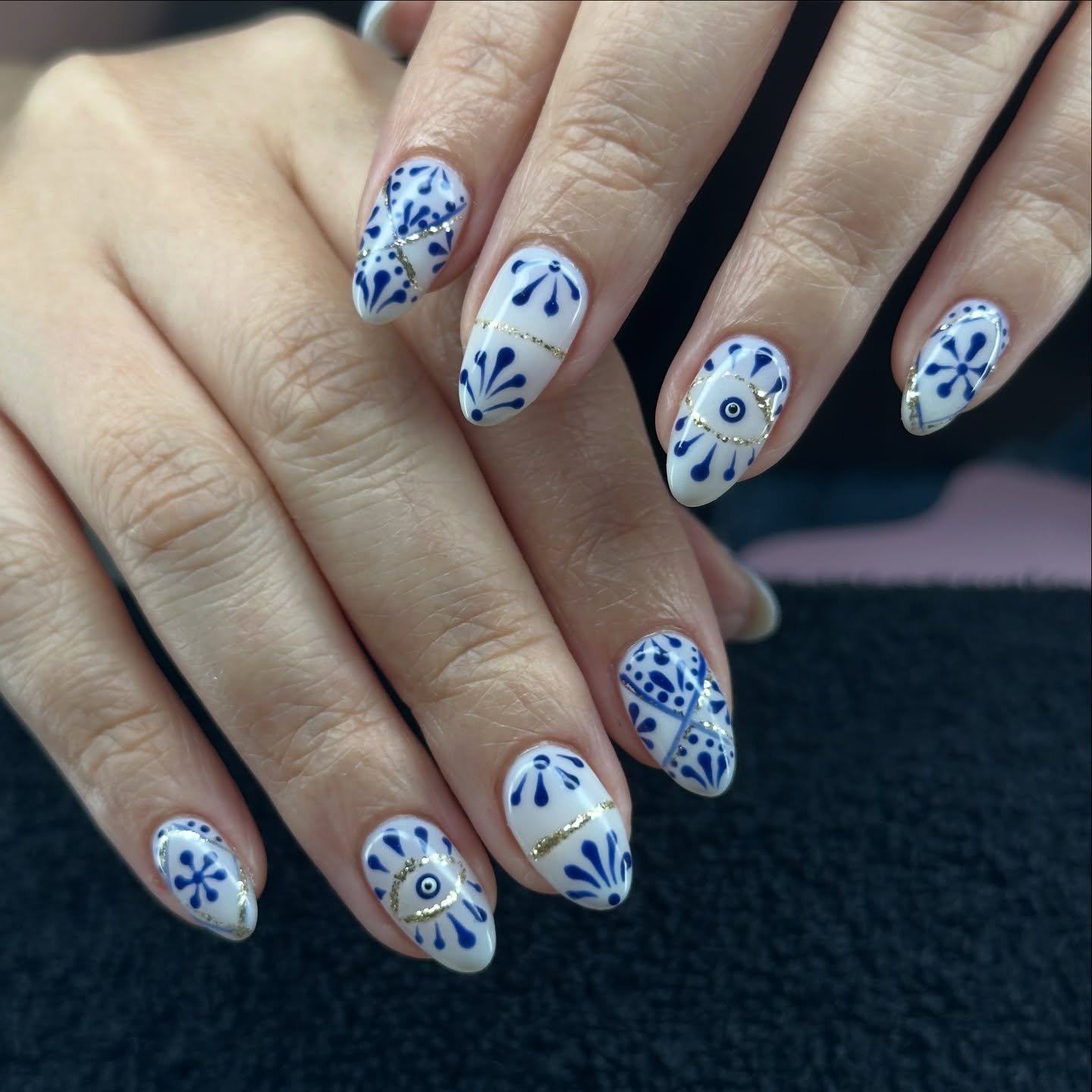 White Nails with Blue Floral Patterns