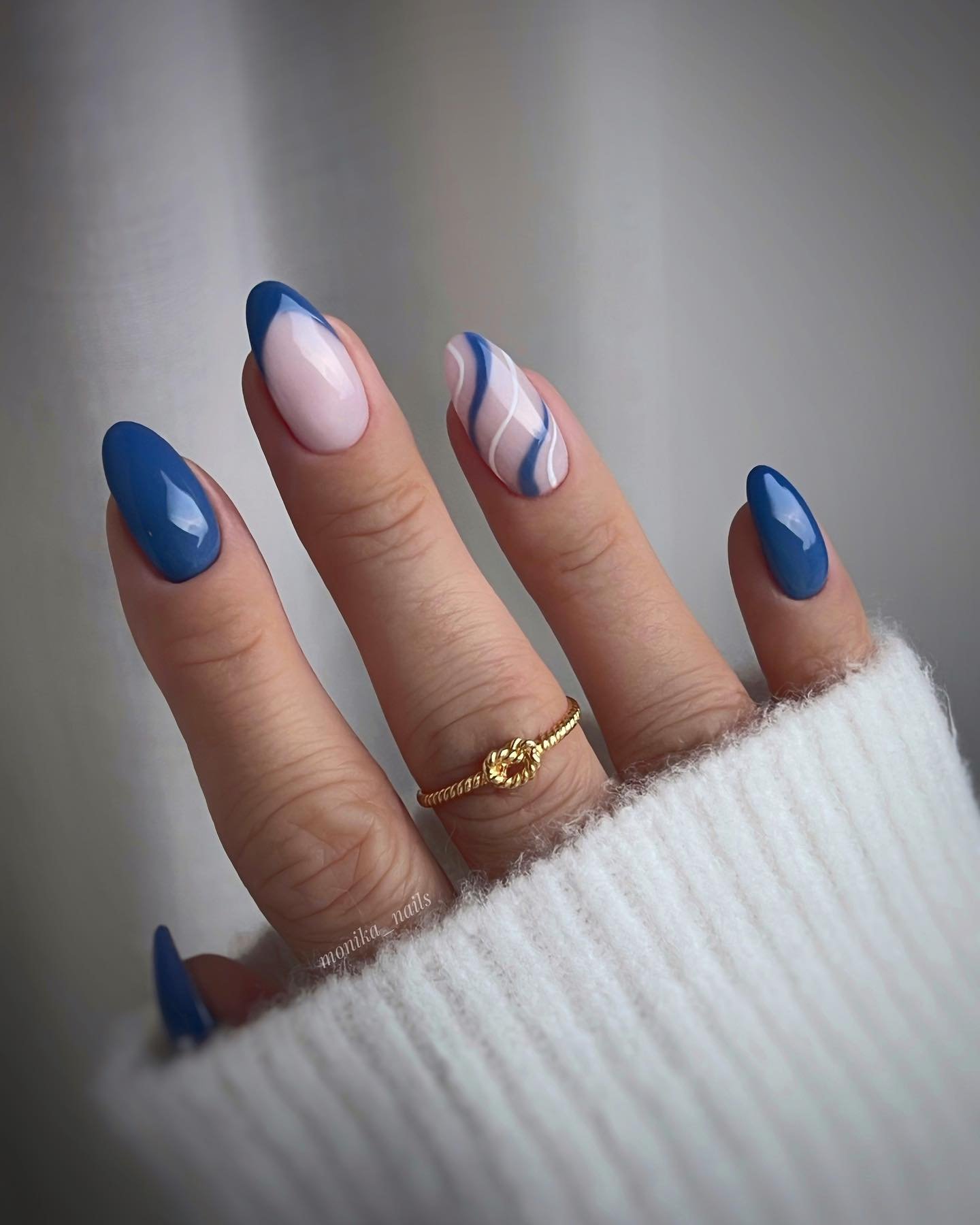 Blue French Tips with a Pink Swirl Accent