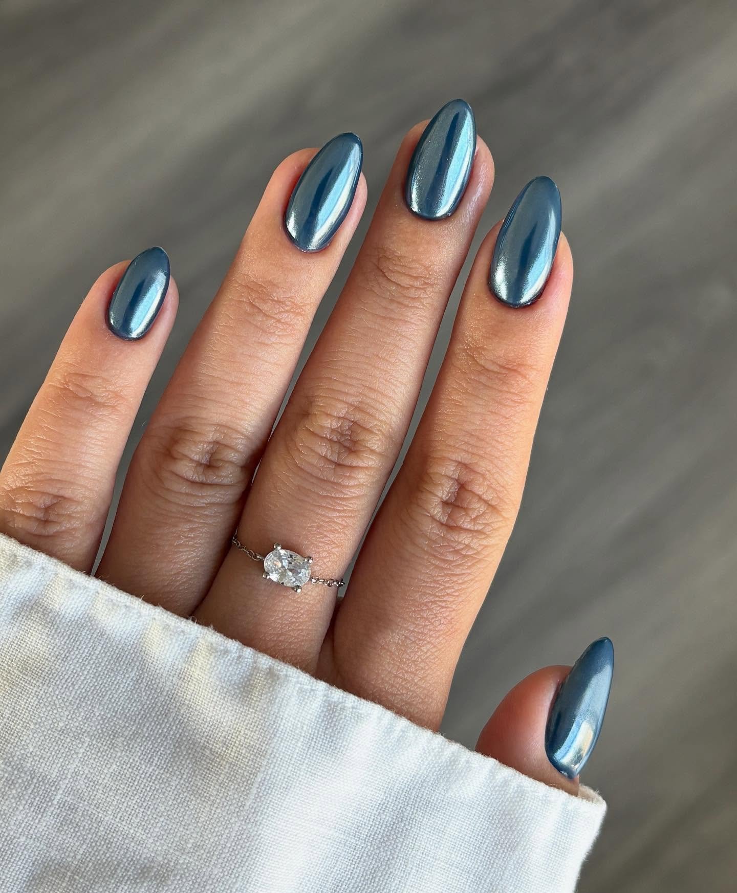 Metallic Blue Almond Nails