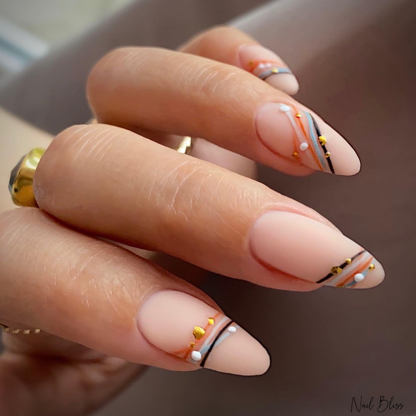 Soft Nude Almond French Nails with Gold Edges