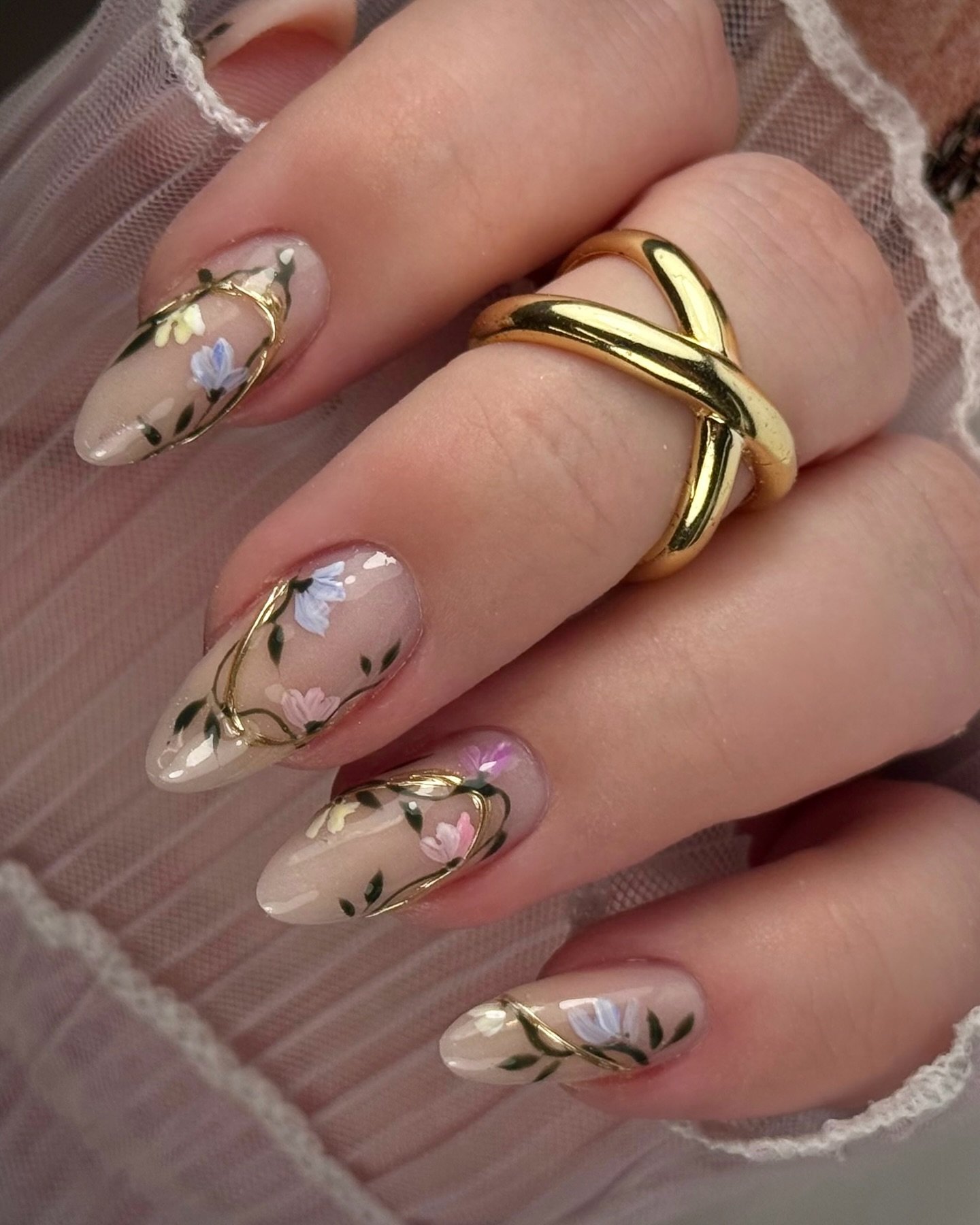 Sheer Nude Almond Nails with Gold and Dark Abstract Lines