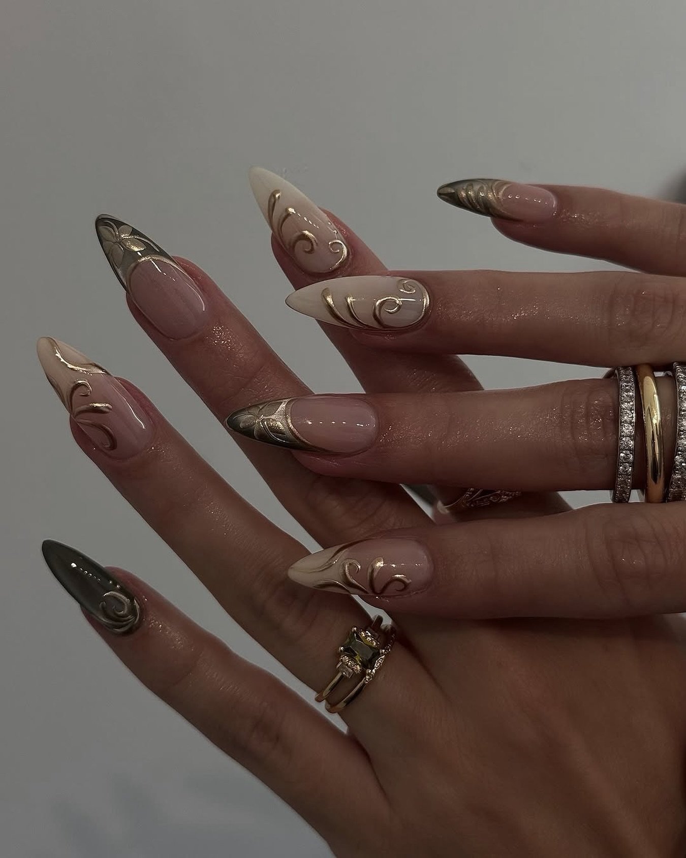 Taupe and Nude Stiletto Nails with Fine Decorative Lines