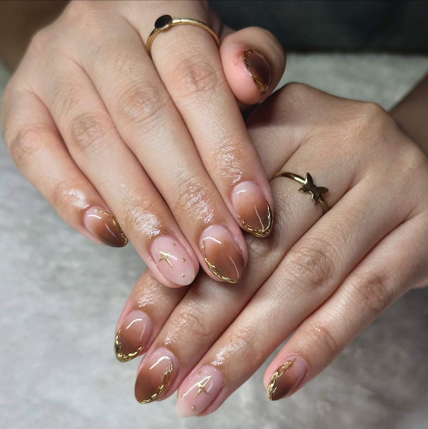 Natural Nude Almond Nails with Subtle Bronze Shimmer