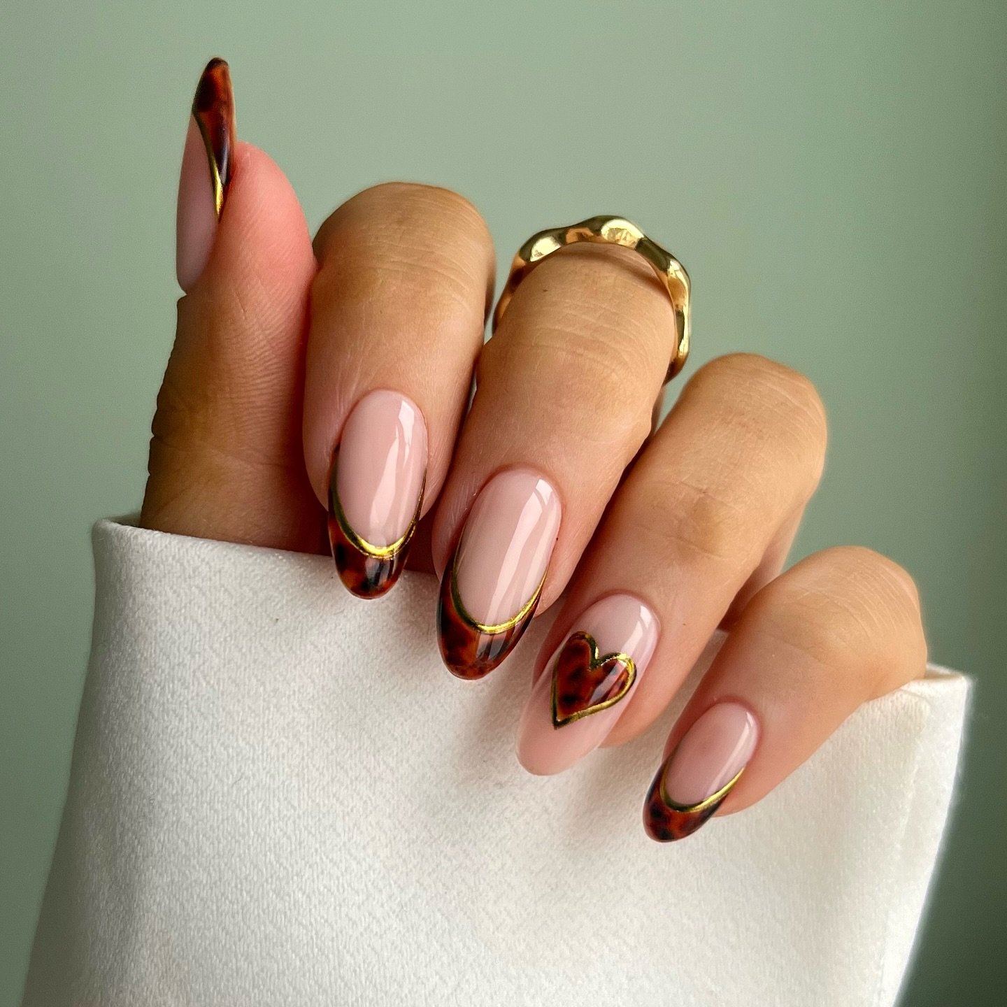 Glossy Brown French Tips on Almond Nails