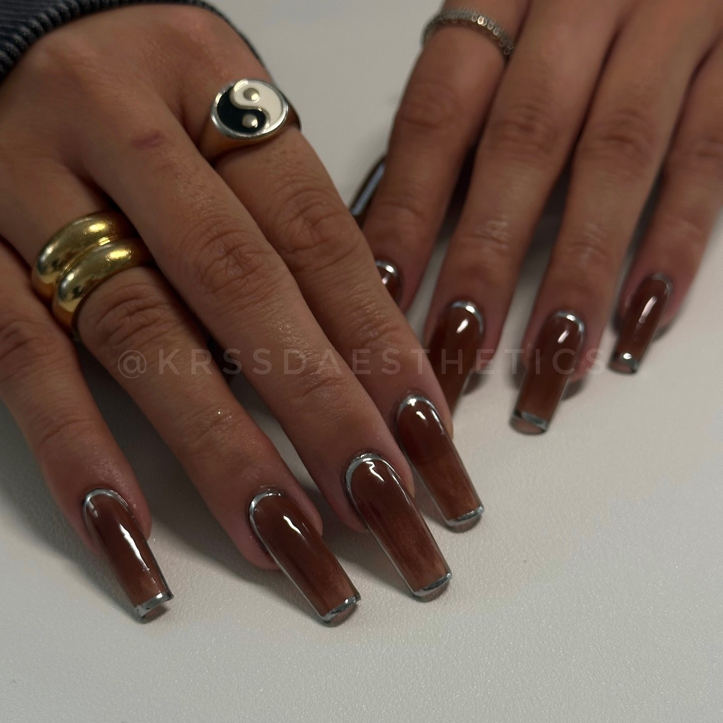 Brown Chrome Almond Nails with Subtle Metallic Tips