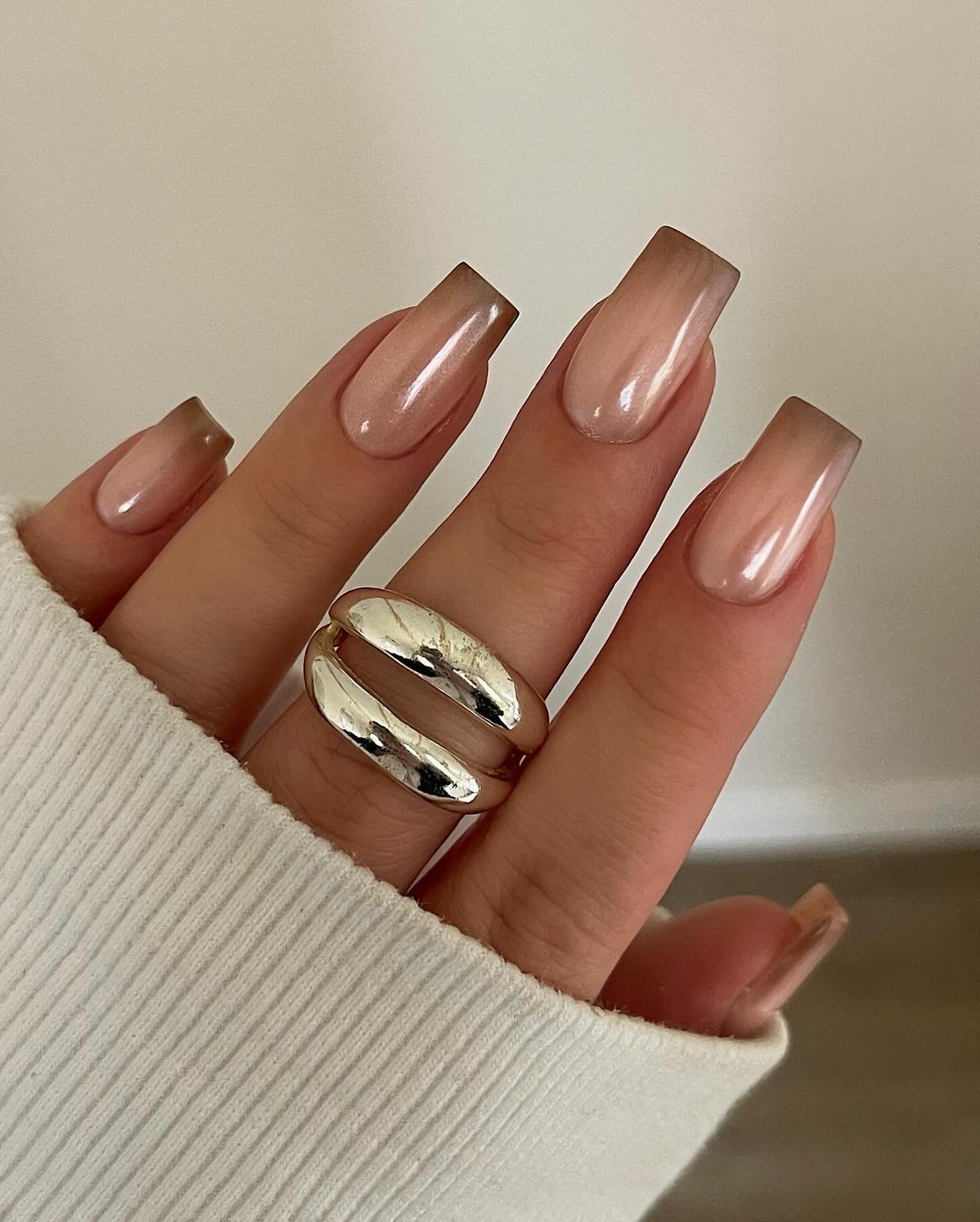 Brown Chrome French Tips on Medium Almond Nails
