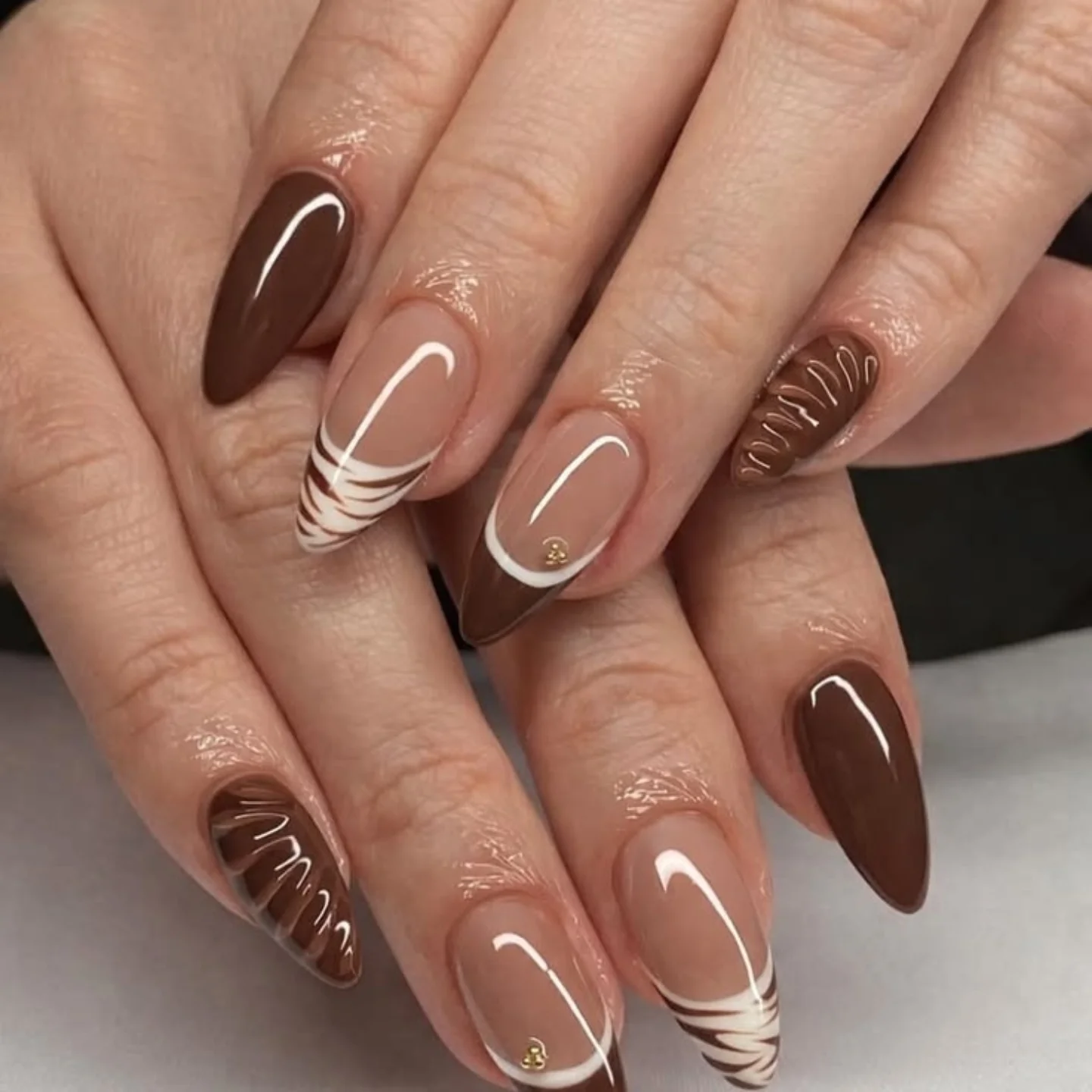 Brown Chrome Nails with White Curved Line Art