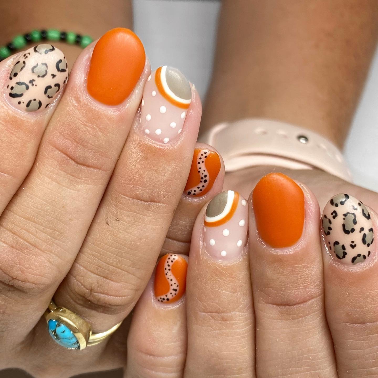 Orange, White, and Leopard Accent Nails