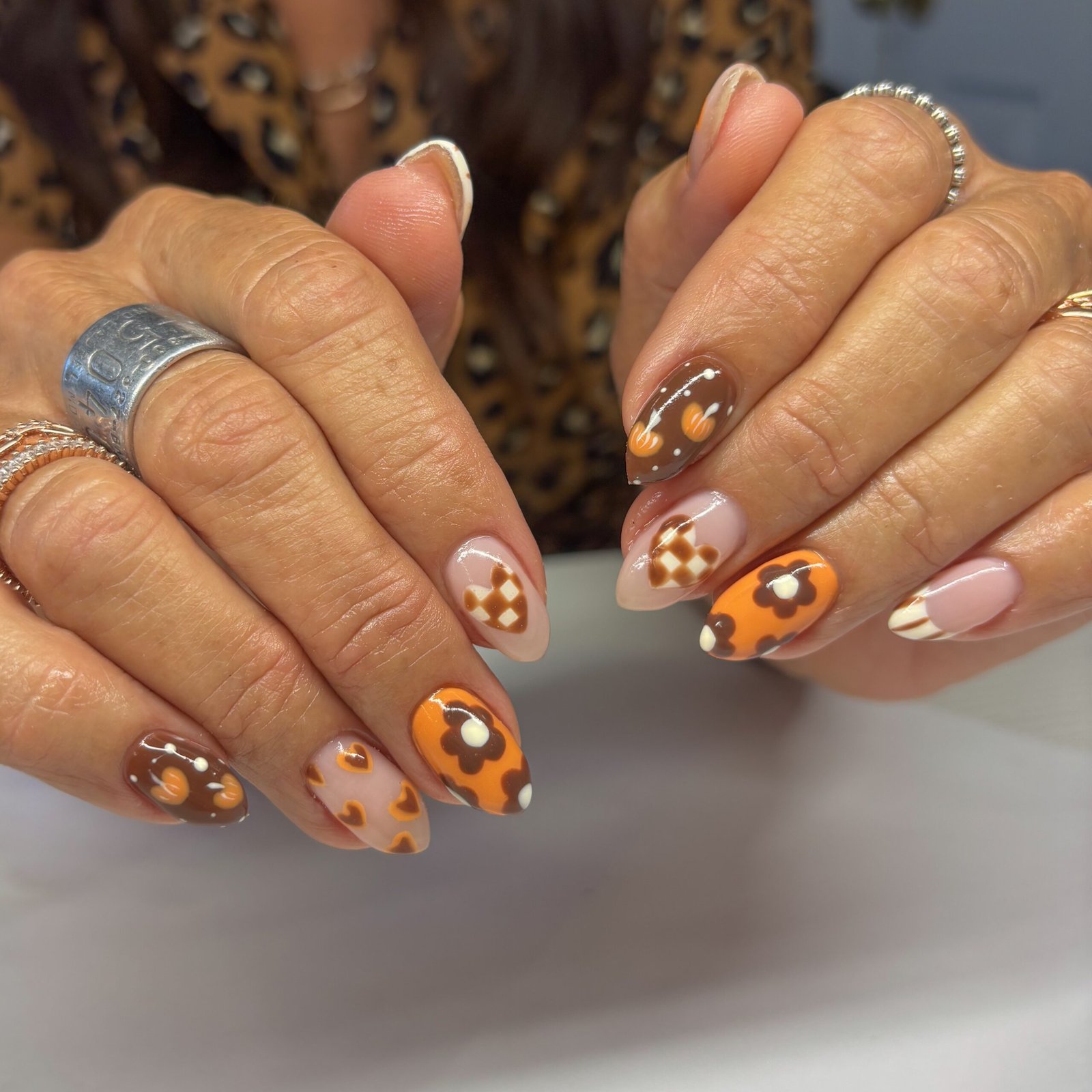 Brown and Orange Floral Accent Nails