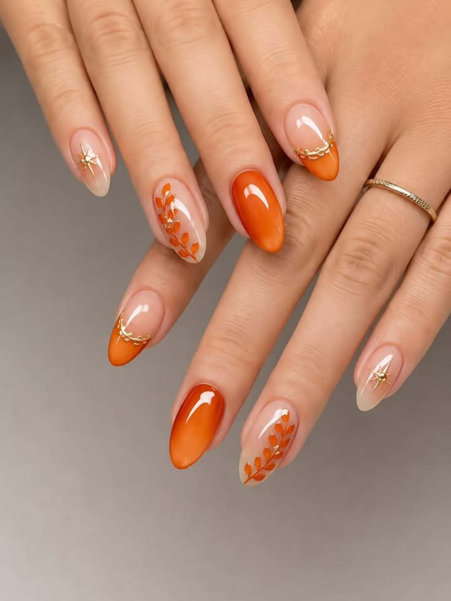 Orange Nails with Brown-and-White Accents