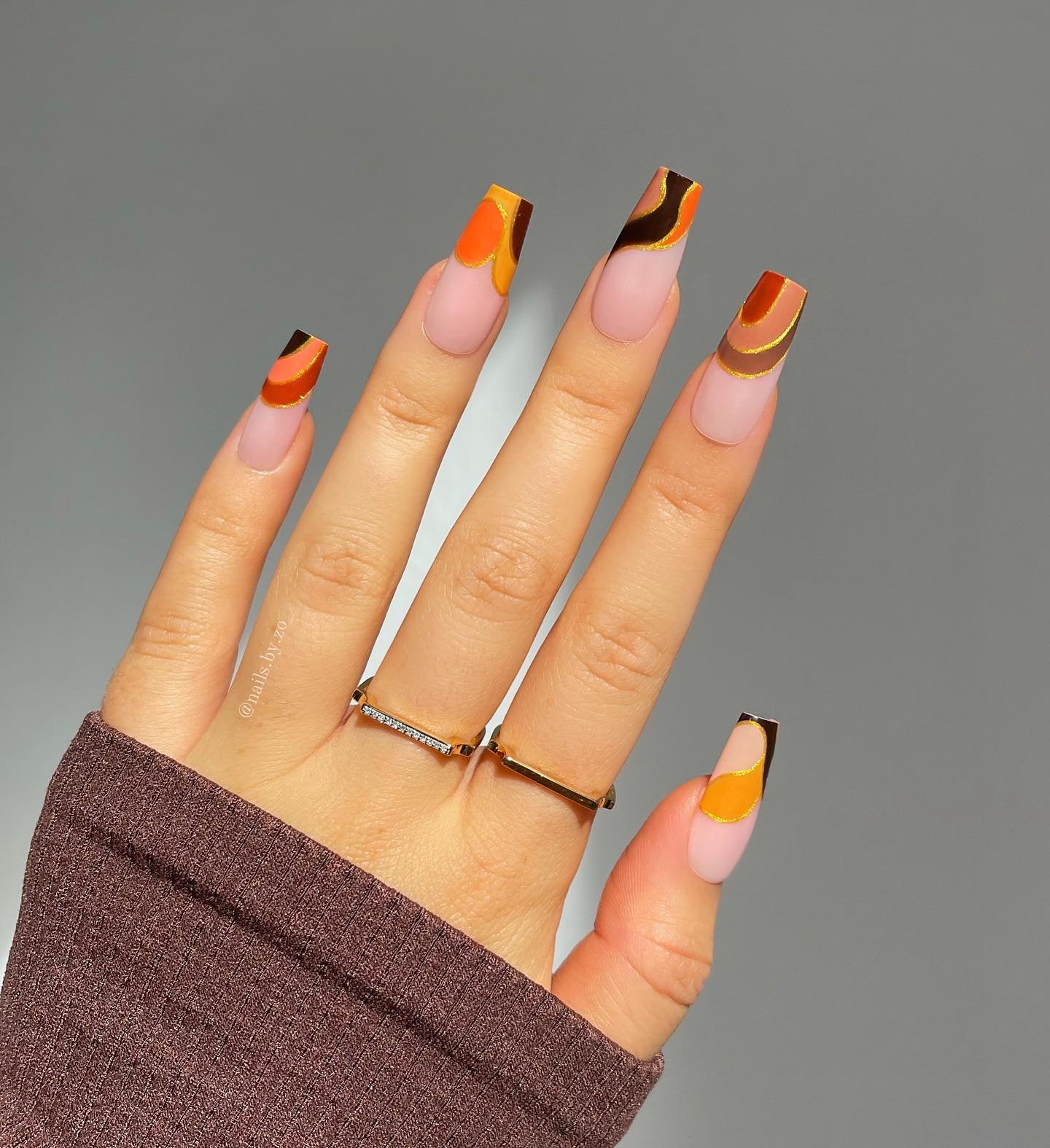 Orange French Tips with Brown and Black Accents