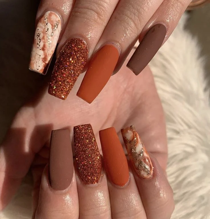 Soft Nude Nails with Orange and Brown Line Art
