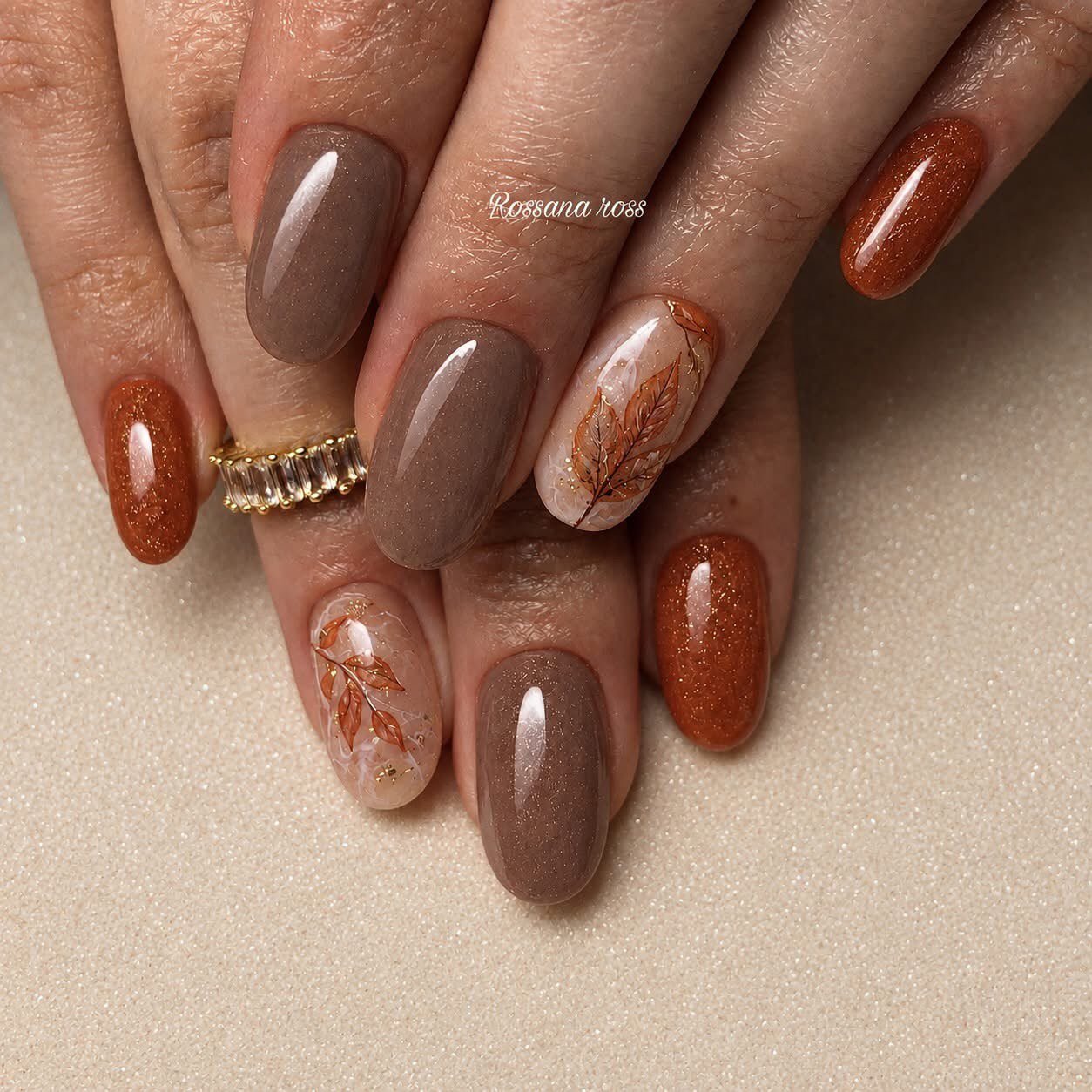 Amber, Brown, and Gold Glossy Nails