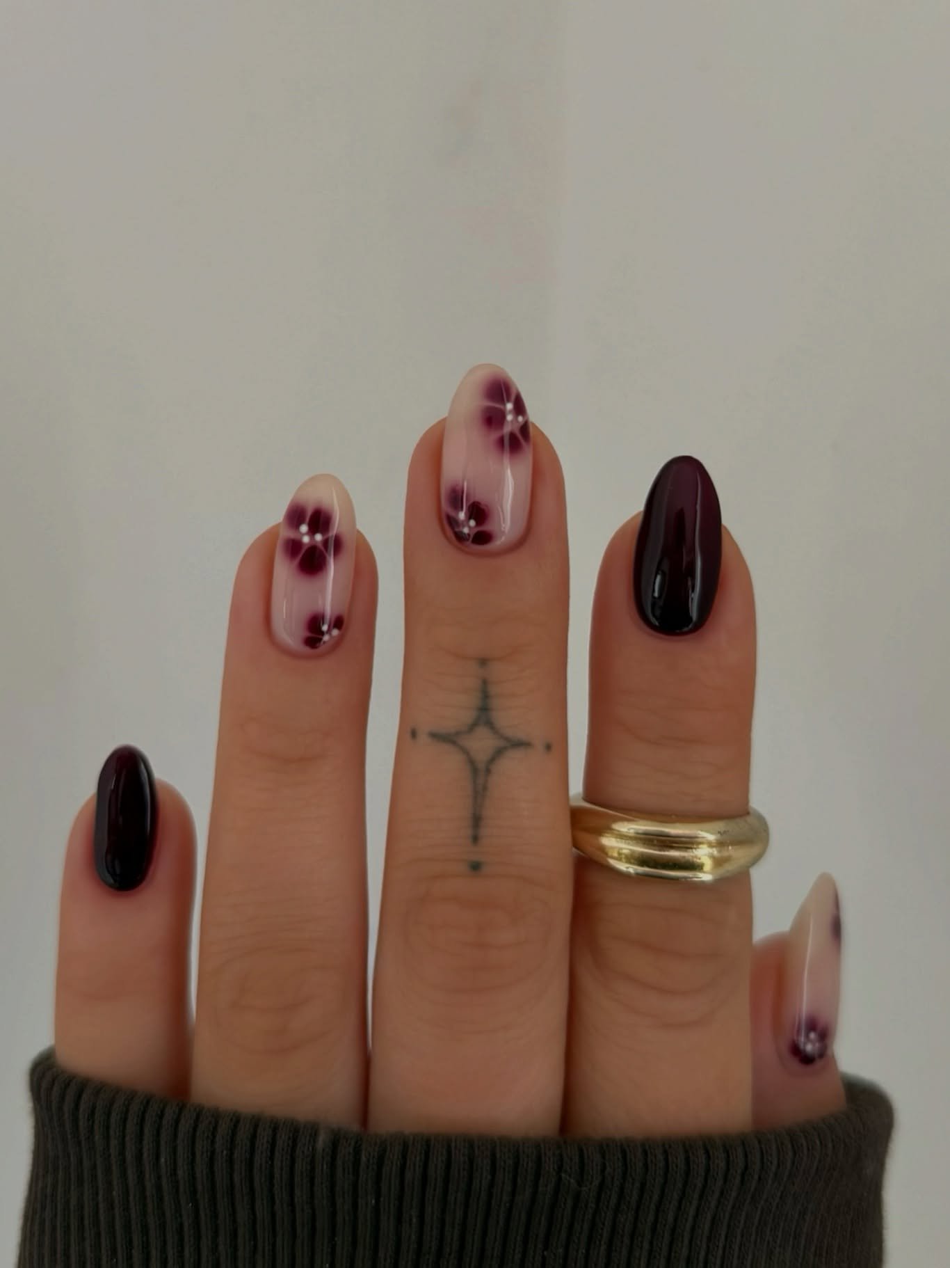 Burgundy Almond Nails with Minimal Star Accents — DO3w3BajFUlCharlotte Cliff.jpg