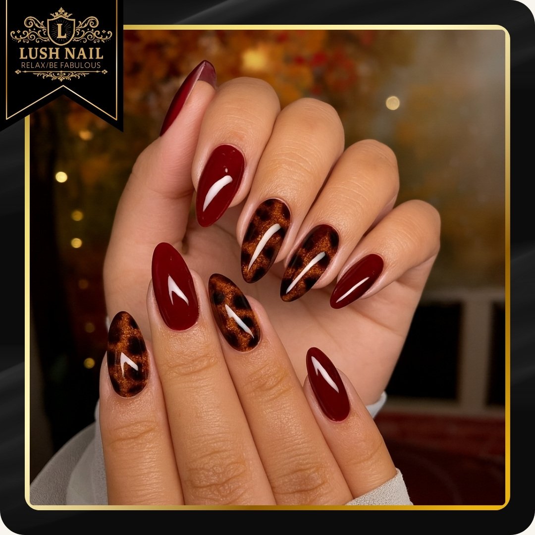 Burgundy Almond Nails with Pink Patterned Accents — DPped-EDmSfLushnails Spa.jpg