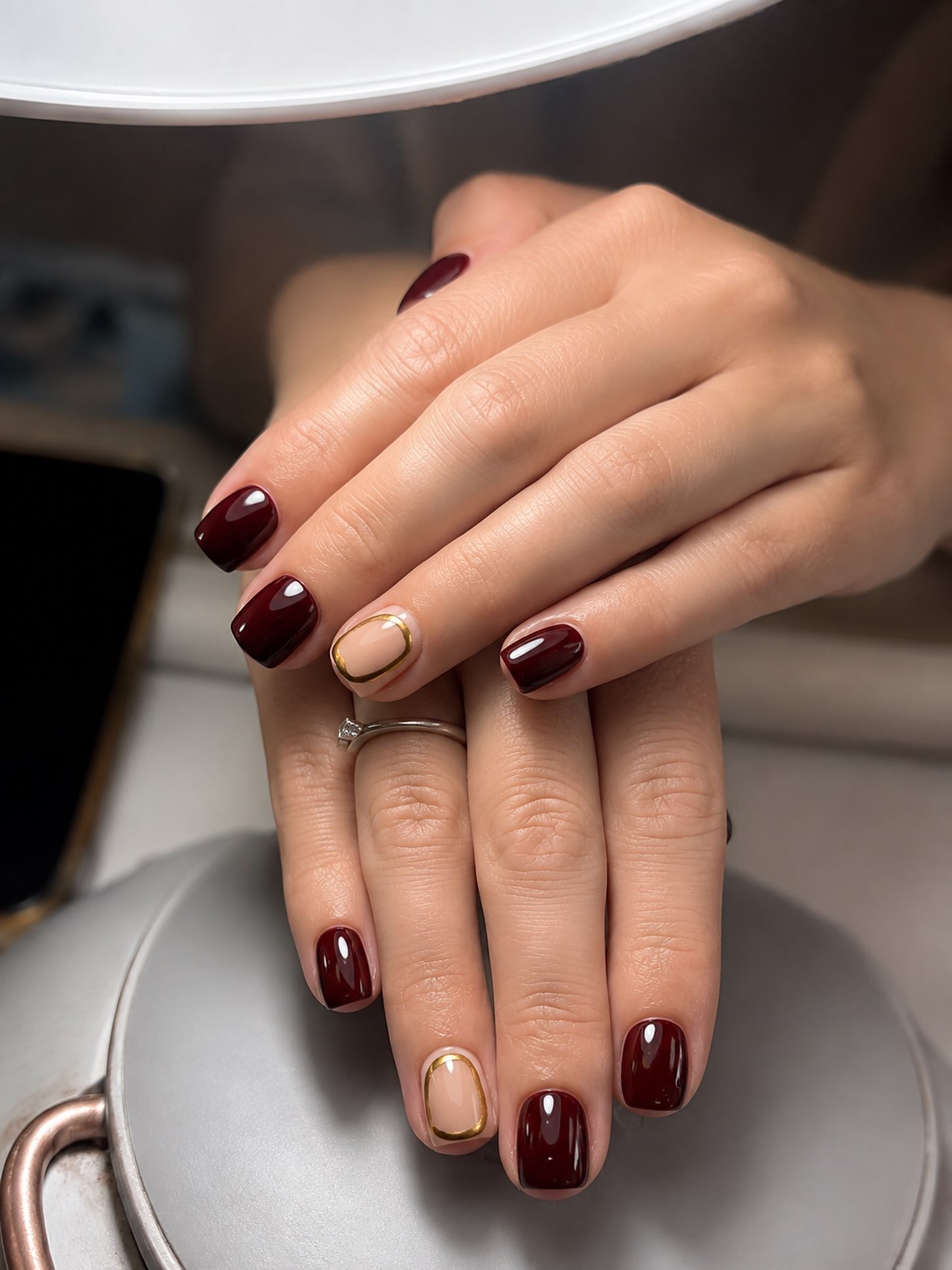 Short Burgundy Nails with a Clean Glossy Finish — DcBKHfMMnzrNegar Zayani.jpg