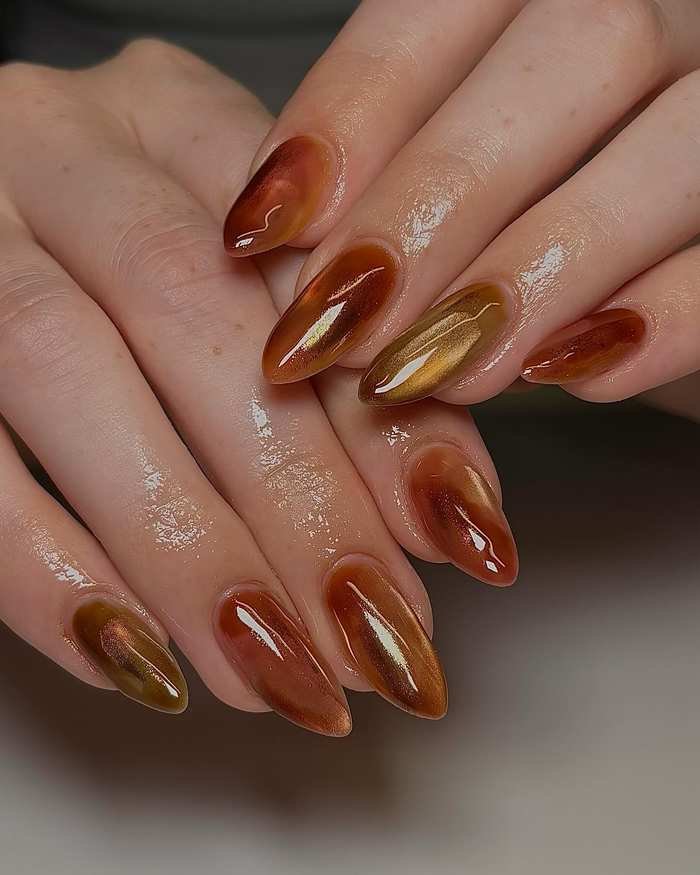 Glossy Burnt Orange Almond Nails