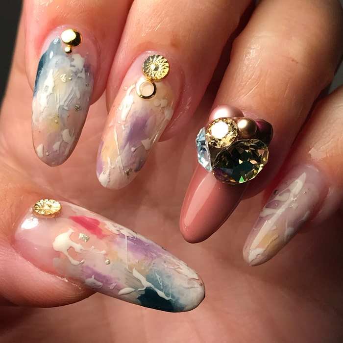 Pastel Marble Nails with Gold Embellishments